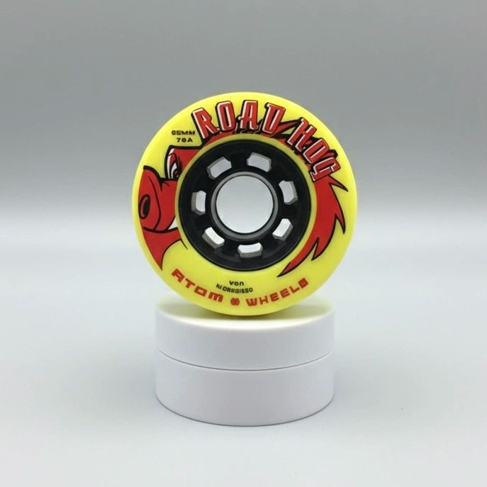 Atom 'Road Hog' branding quad skating wheel on a podium white background