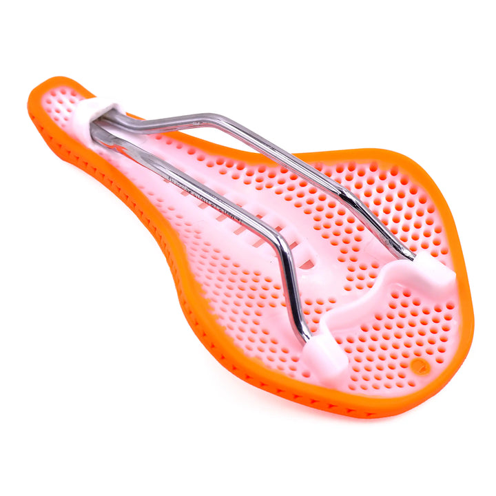 bottom view of Stratos bicycle saddle on a white background 