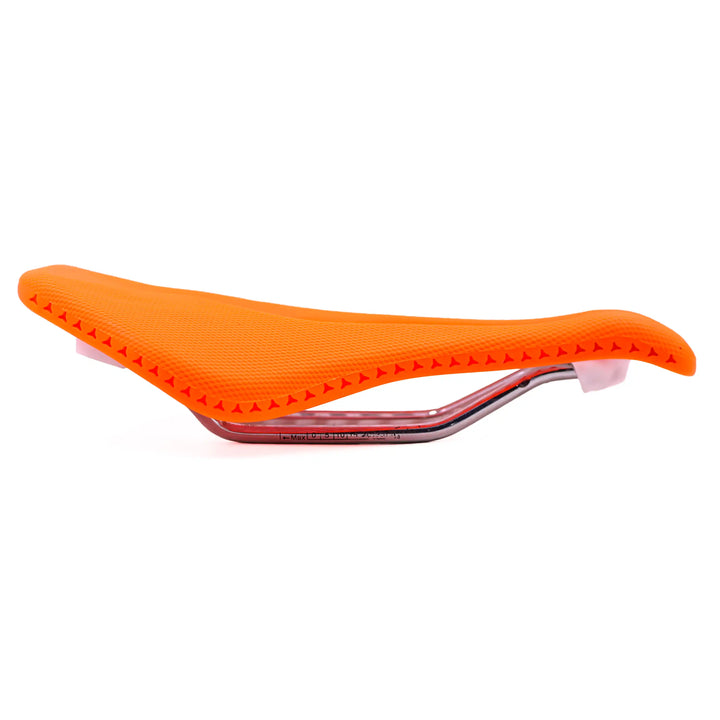 side view of orange Stratos bicycle saddle on a white background 