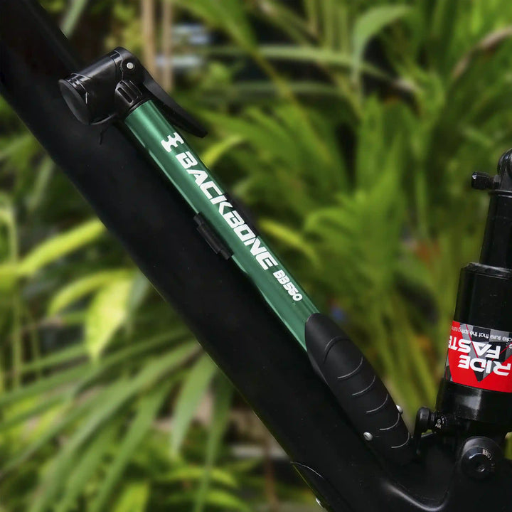 Backbone BB560 Mini Air Pump green fitted on a bicycle
