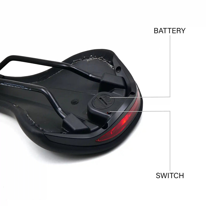 Backbone Memory Foam Saddle With Built in Tail Light black battery and switch view