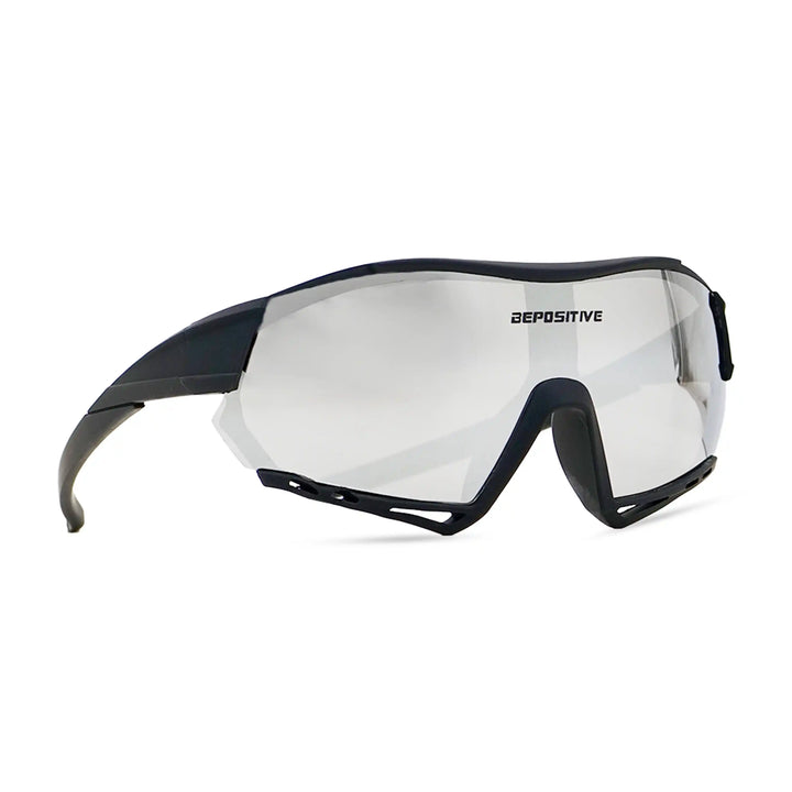 Black and gray sports sunglasses with clear lenses on a white background
