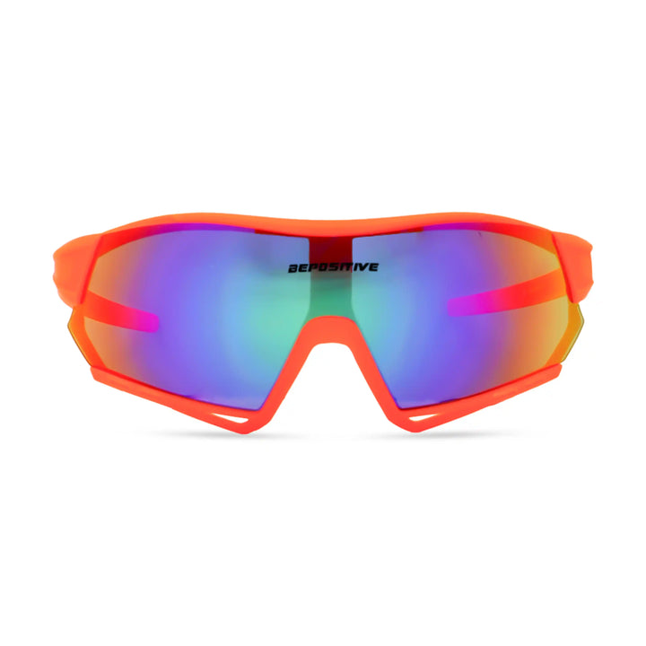 Sunglasses with red frame and multicolored lenses on a white background