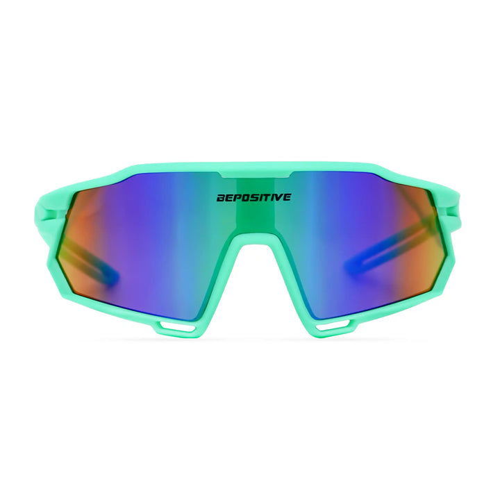 Sunglasses with green frame and multicolored lenses on a white background
