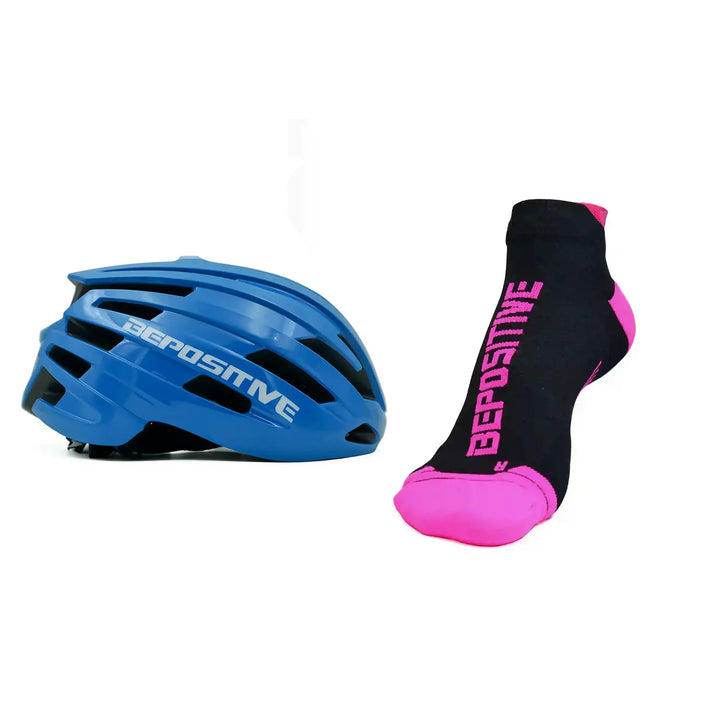 A blue bepositive cycling helmet and pink bepositive Ankle socks on a white background