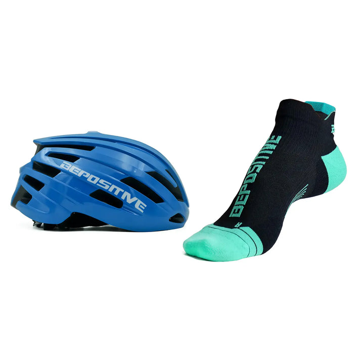 A blue bepositive cycling helmet and Turquoise blue bepositive Ankle socks on a white background 