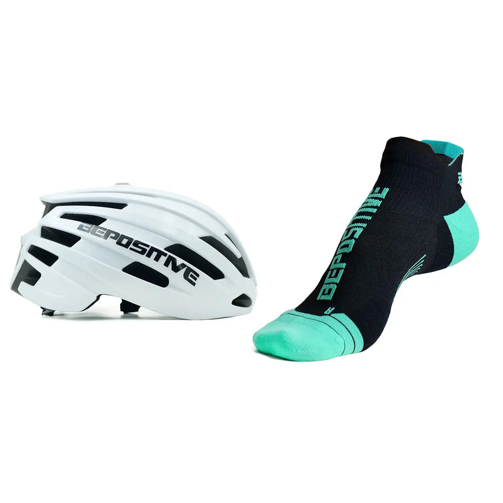 A white bepositive cycling helmet and turquoise blue bepositive Ankle socks on a white background