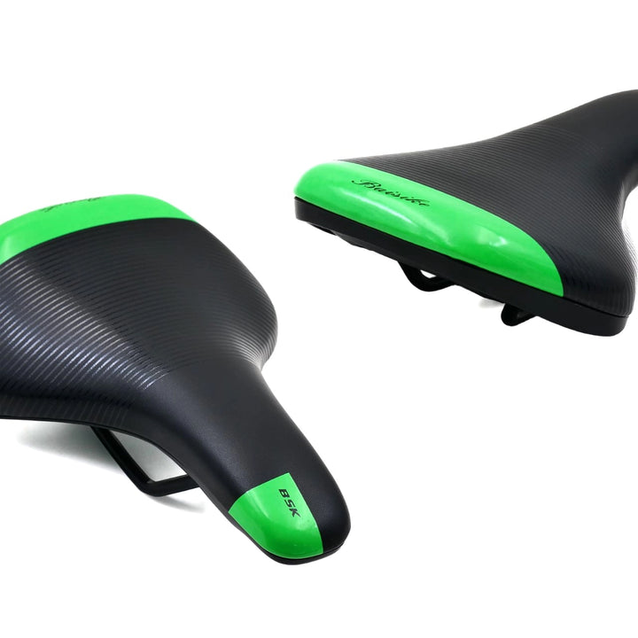 black and green bicycle seat on a white background with different angle