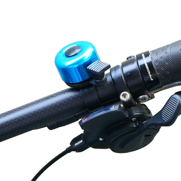 Cycle Chime Bell blue fitted on a bicycle handlebar
