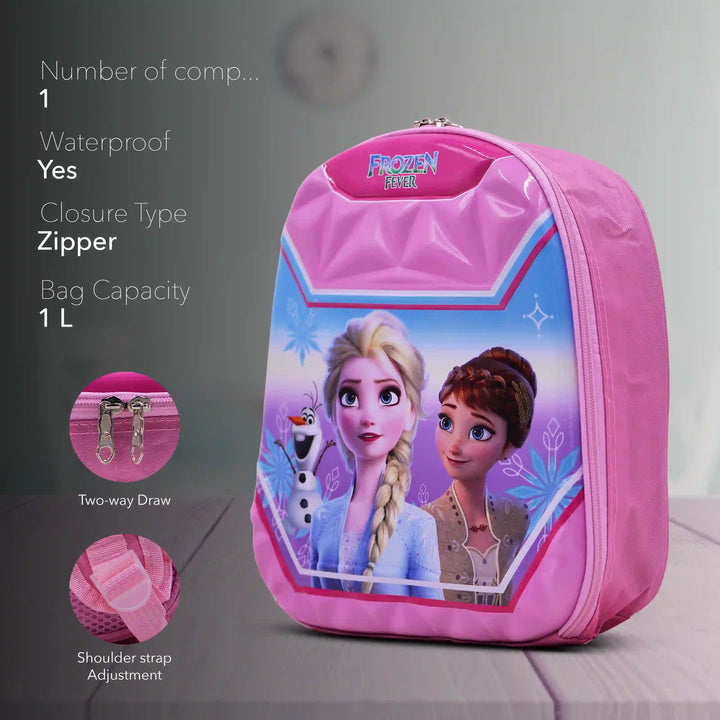 Pink backpack with Frozen characters on a gray surface