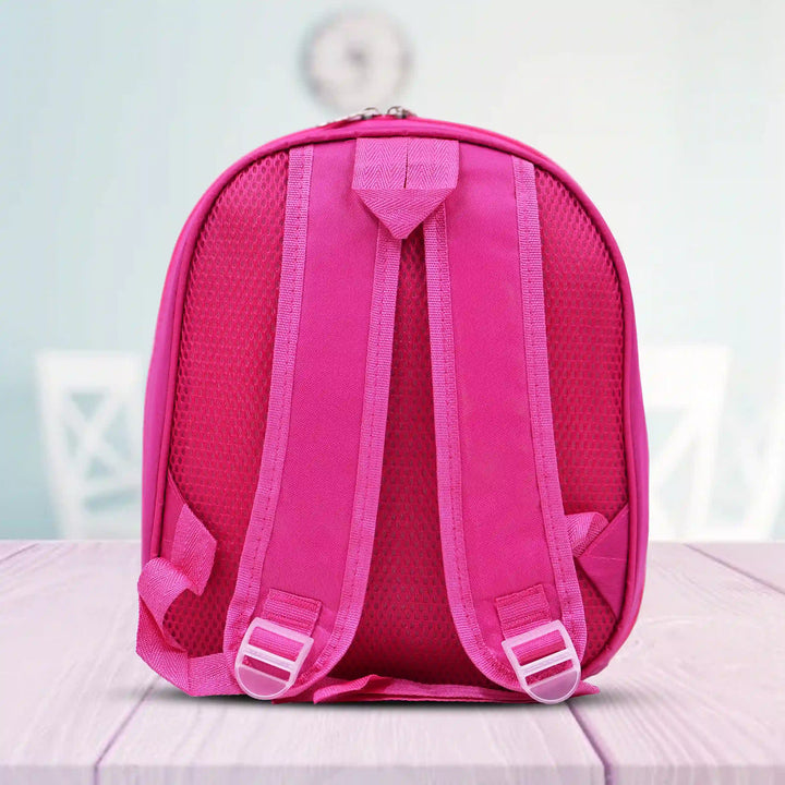 back view of a Pink backpack on a white surface with a light blue background