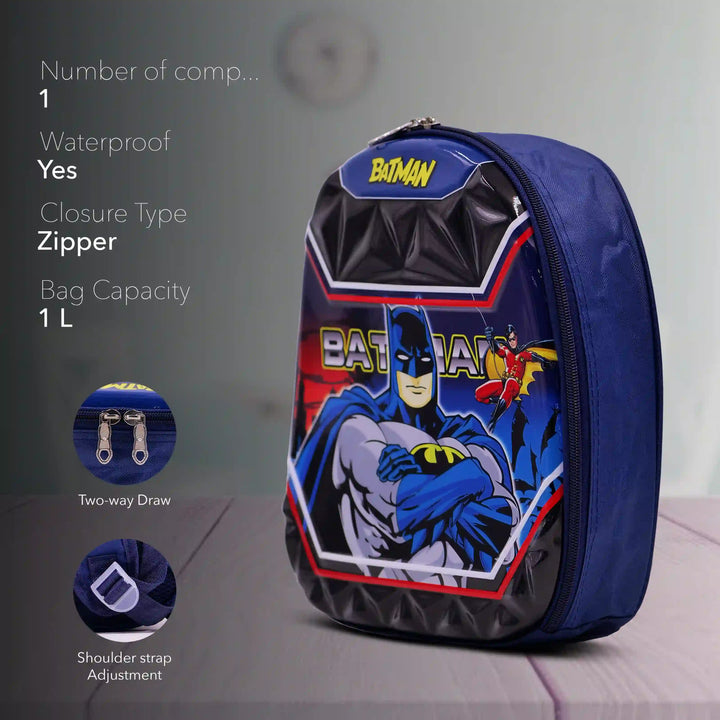 Batman-themed backpack with features listed on a gray surface