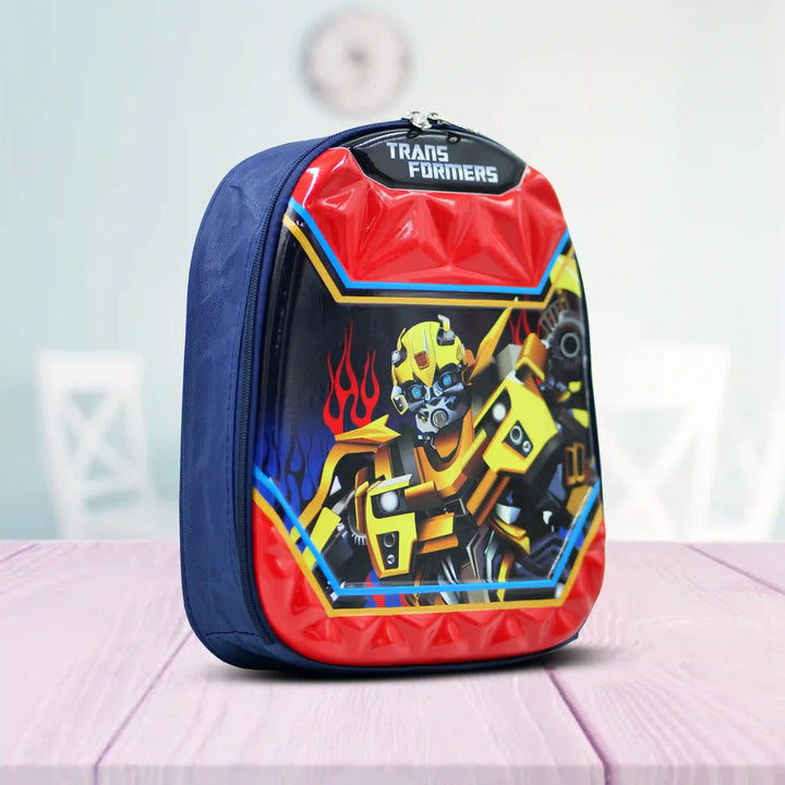angle view of a Backpack with Transformers design on a light pink surface