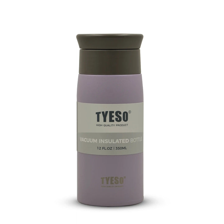 Vacuum insulated bottle with purple body and Brown lid on a white background
